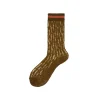 Calza longuette traforata con riga sul polsino Coraline